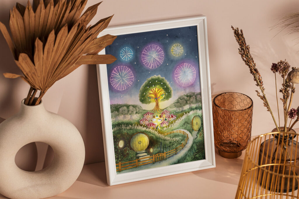 Framed photo of a watercolour painting depicting Bilbo's birthday party in Hobbiton